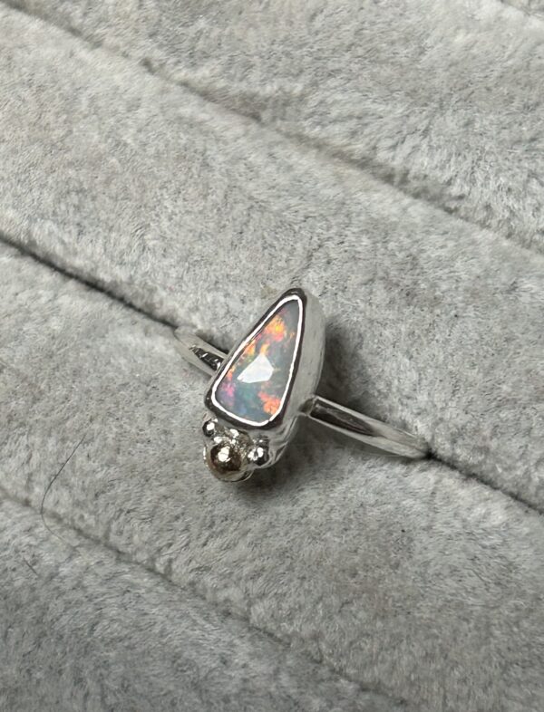 Solid mixed metal opal ring