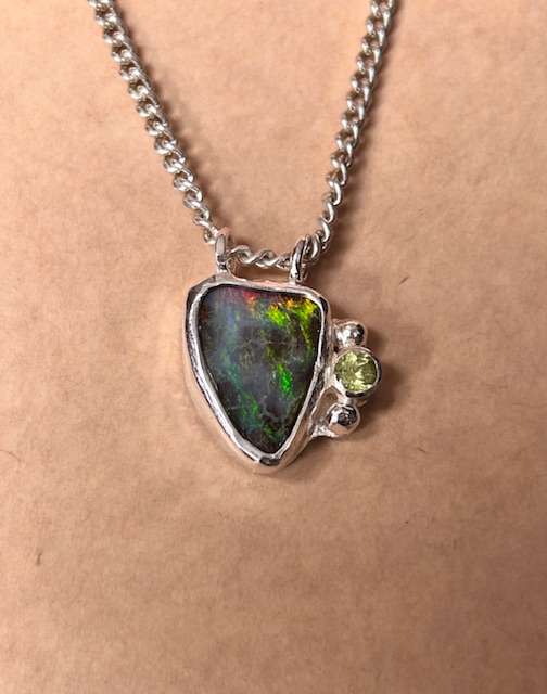 Glowing Boulder Opal and Peridot pendant