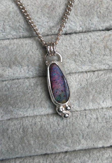 Glittery boulder opal pendant